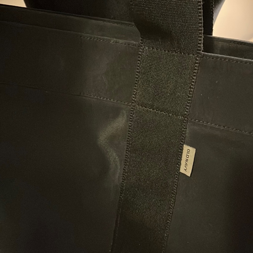 Old Navy Black nylon tote bag. Great pockets and compartments. Sturdy Strap - Picture 3 of 12